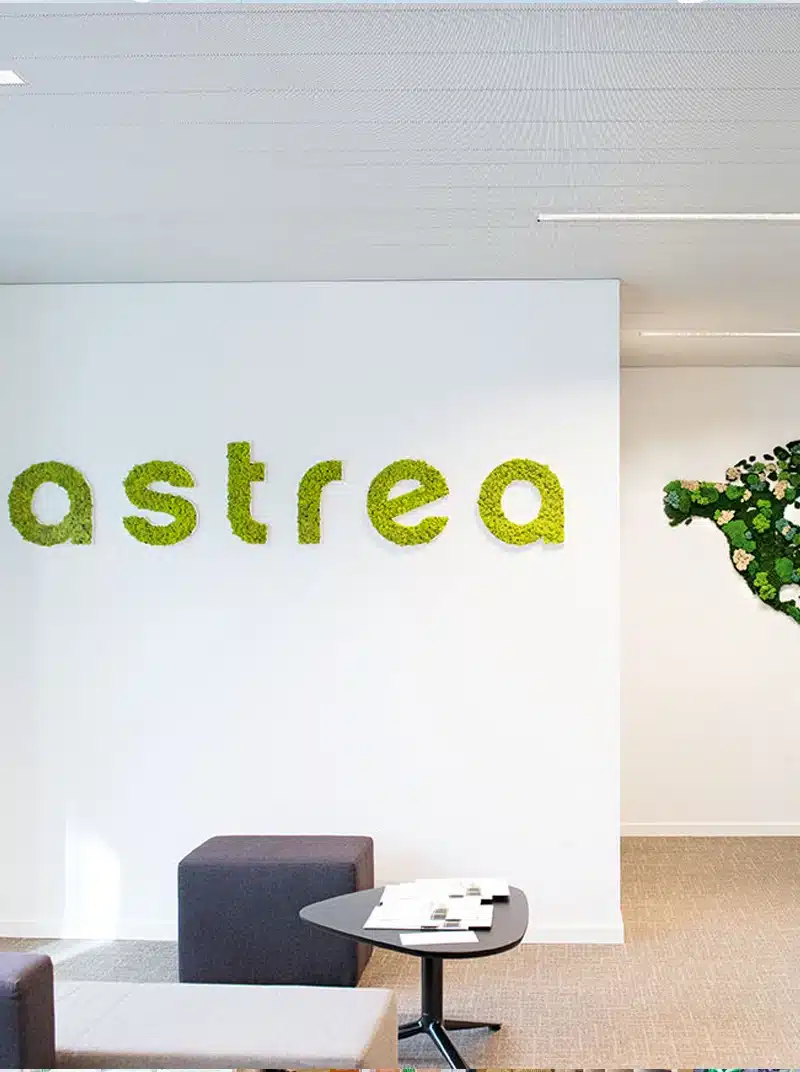 Green moss astrea sign in modern office space.